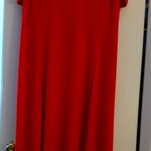 Red, cold shoulder, high low dress by Bon Ton's Relativity. The size is 3X. NEW